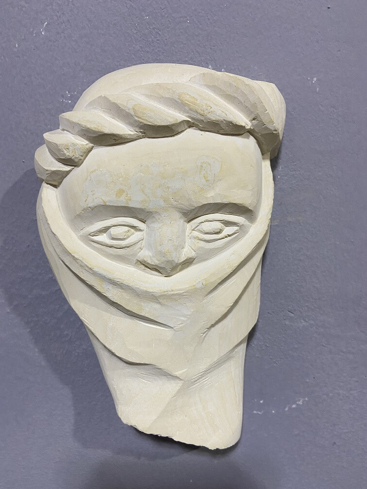 Sculpture visage en calcaire atelier d'Agadir
